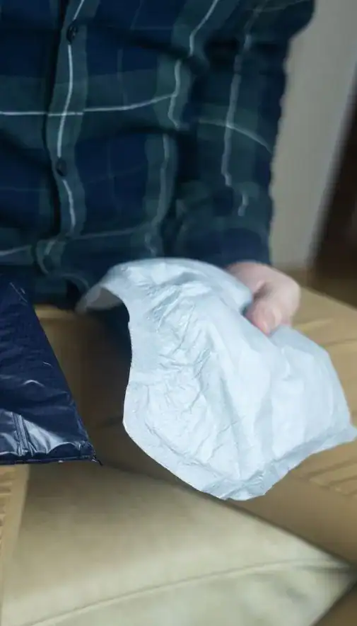 Image of man holding incontinence pads as part of overactive bladder treatment Southend-on-Sea